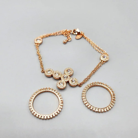 Joan Boyce Pave Crystal Christian Cross Bracelet w/ Rings  Rose Gold Tone - Picture 1 of 16